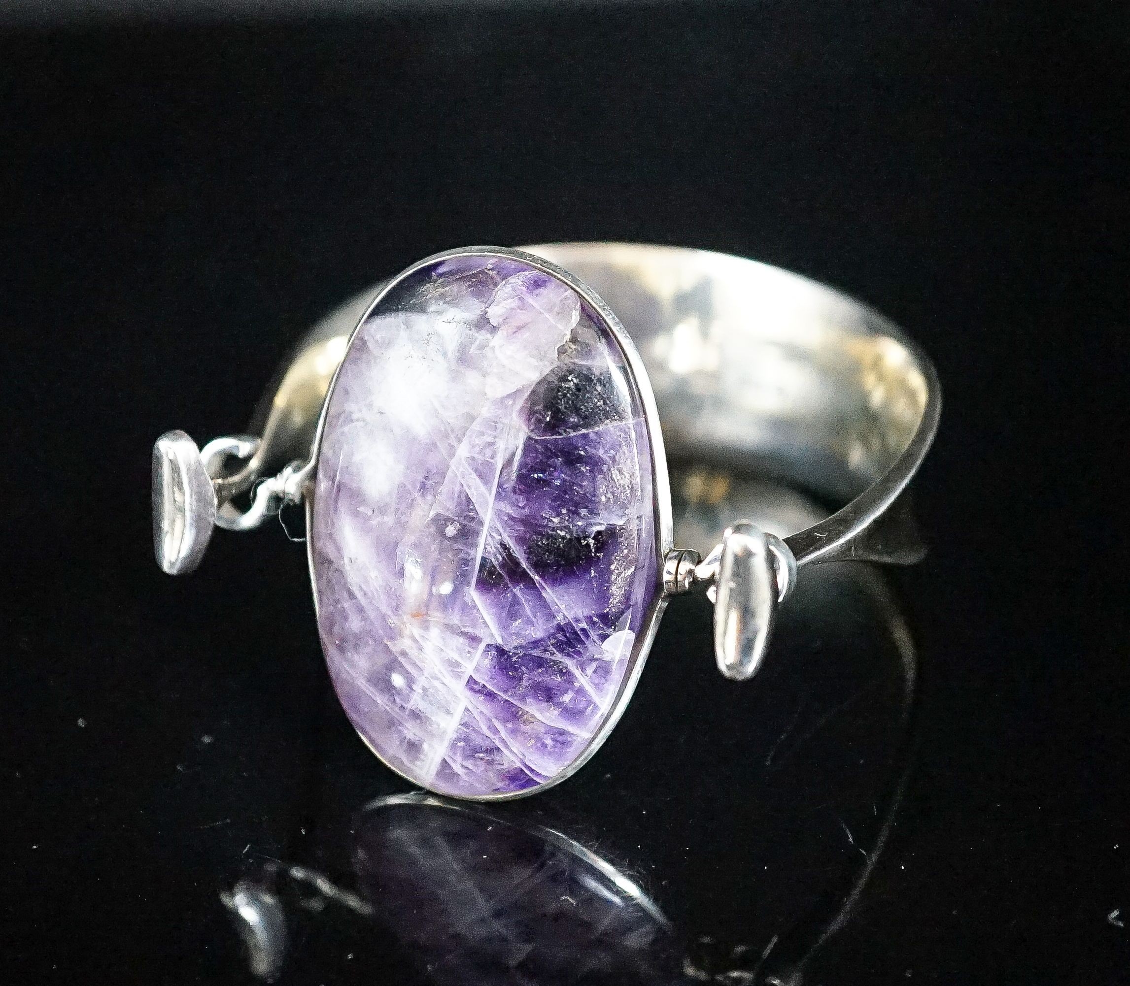 A Vivianna Torun for Georg Jensen sterling and amethyst quartz set openwork bangle, no 203, stone length approx. 43mm.